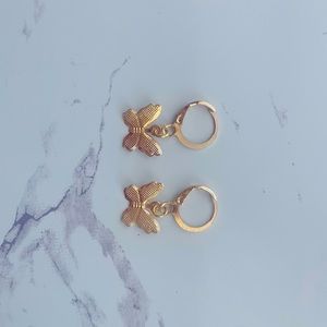 Super cute handmade gold butterfly earrings.